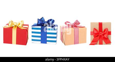 Gift boxes. Row of brightly colored gift boxes with ribbons isolated on white background. Colorful gift boxes Stock Photo