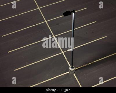 Dark asphalt parking lot with crisp white lines Stock Photo