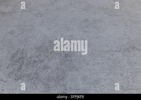 Gray stone surface background with subtle speckled pattern Stock Photo