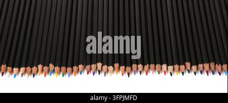 Colored pencils lined up on white background. Color pencils isolated on white. Stock Photo