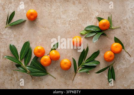 Mandarins fresh citrus fruit with green leaves Stock Photo