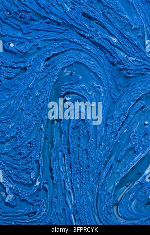 Deep blue textured fluid art abstract background with intricate cell structures and paint peaks Stock Photo