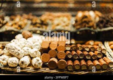 Assorted chocolate truffles are displayed at La Boqueria market in Barcelona, Spain. Stock Photo
