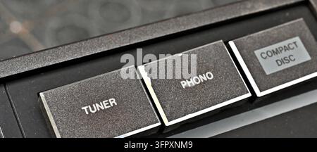 Close up of vintage audio selector buttons tuner phono compact disc Stock Photo