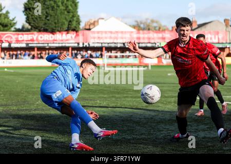 Vertical Intercept Example Barrow AFC #19 Arian Allen & Tamworth's #29 Hayden Carson battle for ...