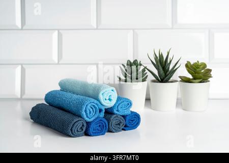 Colorful microfiber towels on a modern kitchen. Kitchen utensils Stock Photo