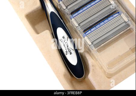 Iserlohn, Germany - September 20, 2026: Wilkinson Sword razor handle and replaceable razor blade cartridges in cardboard packaging. Stock Photo