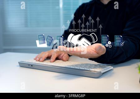 Hand hovers over keyboard with floating procurement icons. Person focused on digital task. Ideal for business, tech, or supply chain themes Stock Photo