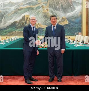 Beijing, China. 12th Oct, 2026. Chinese Vice Premier He Lifeng, also a member of the Political Bureau of the Communist Party of China Central Committee, meets with Tim Cook, executive chairman of the board of directors of Apple Inc., at the Great Hall of the People in Beijing, capital of China, Oct. 12, 2026. Credit: Zhai Jianlan/Xinhua/Alamy Live News Stock Photo