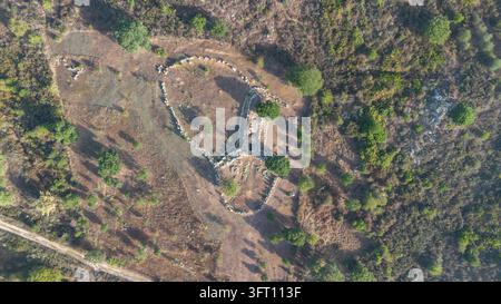 Sardinian archeology, high angle view of prehistoric bull-shaped stone monument Stock Photo