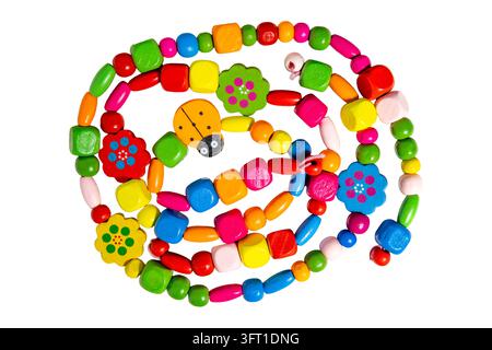 High angle view of handcrafted colorful wooden bead necklace featuring ladybug and flower shapes Stock Photo