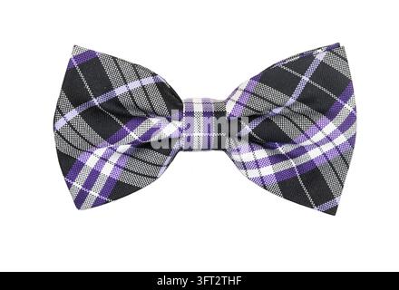 A pre-tied men's bow tie featuring a classic plaid tartan pattern in purple, black, and white, isolated on a clean white background. Stylish menswear Stock Photo