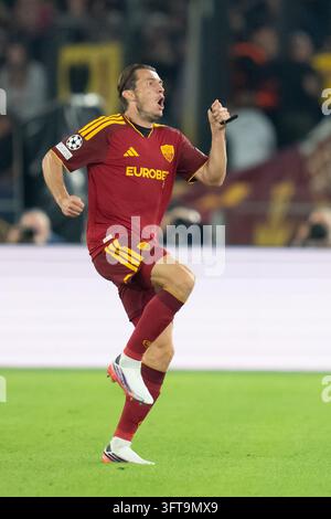 Marten De Roon of Roma celebrates scoring his goal during the Champions ...