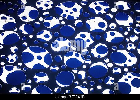 metallic design of geometric contrasting circles through the evening sky Stock Photo