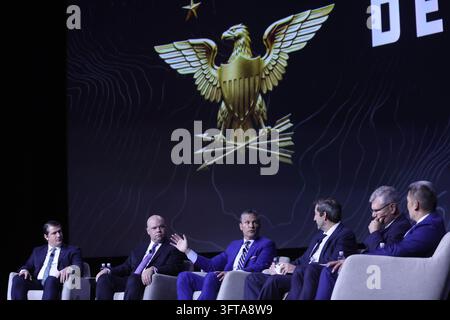 Adam Telle, Acting Secretary of the Army, speaks at the opening ...