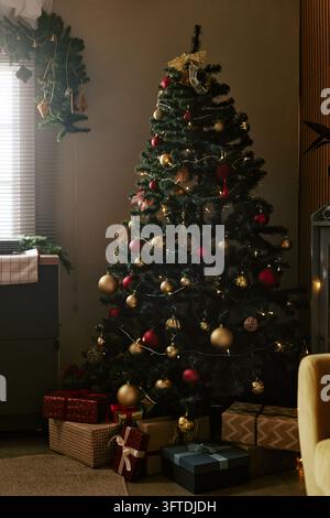 Decorated Christmas Tree with Gift Boxes for Holiday Celebration Stock Photo