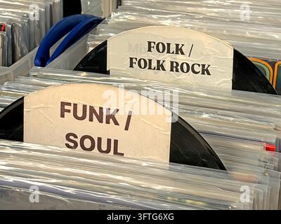 Funk soul and folk rock vinyl album sections at a record fair Stock Photo