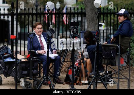 Lindyll WASHINGTON, OCTOBER 15: Mike Lindell, founder of My Pillow, (3-R) sits ...