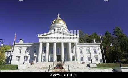 MONTPELIER, VERMONT, USA - OCTOBER 10, 2026: Vermont state house building in montpelier featuring a golden dome during autumn Stock Photo