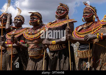 Close-up of Pokot tribe women singing with beaded face strings giant beaded collars and brass earrings, Baringo County, Churo, Kenya Stock Photo