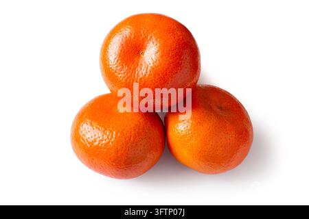 A bunch of ripe tangerines on a white background. Tangerines close-up with shadow. Stock Photo