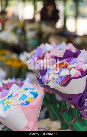 Red Roses Bouget Chrysanthemums in various colors, including white, yellow, ink and ...