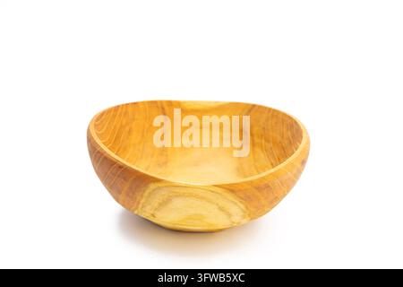 Small Empty Wooden Bowl in Three Quarter View on White Background Stock Photo