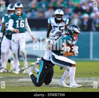 Lemon Phot Philadelphia Eagles wide receiver Makai Lemon (9) is brought down by ...