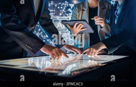 Energetic, forward-thinking professionals work together at a high-tech ...