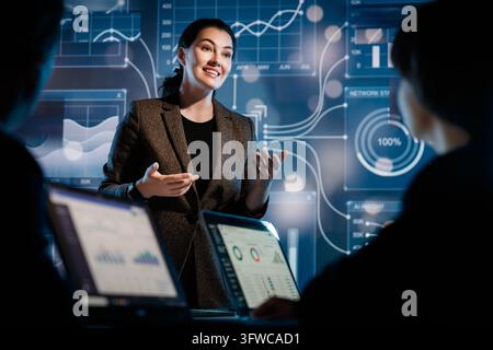Network Datad Dynamic business scene featuring a confident female leader presenting ...