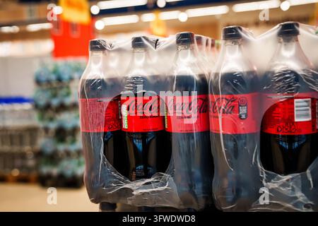 RIGA, LATVIA. 12th March 2026. Shrink-wrapped multi-packs of Coca-Cola Zero Sugar plastic bottles displayed in a supermarket aisle in Riga, Latvia. Stock Photo