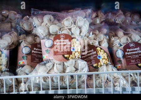 RIGA, LATVIA. 12th March 2026. Packages of Chef Select frozen meat dumplings, Pelmeni stacked inside a grocery store freezer shelf in Riga, Latvia. Stock Photo