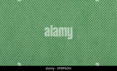 High-quality green texture of synthetic or blended fiber with a regular weaving pitch. The image is intended for use as a seamless background, a mocku Stock Photo