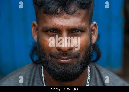 Close-up portrait of a smiling bearded man, Northern Province, Jaffna, Sri Lanka Stock Photo