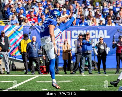New York Giants punter Jordan Stout (15) punts against the Houston ...