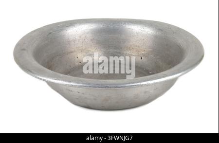 Aluminum plate isolated on white background. Vintage old aged bowl. Stock Photo