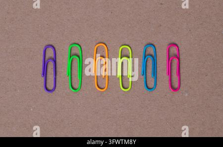 Colorful Paper Clips Arranged In Symmetrical Minimal Composition Stock Photo