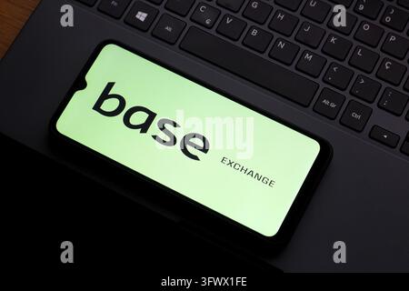 In this photo illustration, the Base Exchange logo is seen displayed on ...