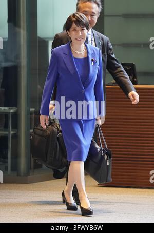 Japanese Prime Minister Sanae Takaichi enters the Prime Minister's Office in Tokyo, Japan, Wednesday, Oct. 21, 2026. Her administration marked its first anniversary Wednesday. Stock Photo