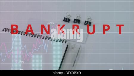 Displaying red BANKRUPT overlay covering light-gray desk, with notebook, binder clips, charts. Flatlay, finance, crisis, warning, minimalist, office, Stock Photo