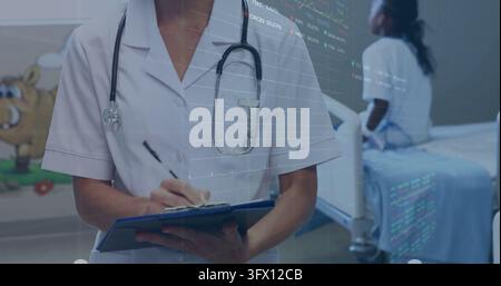 Writing nurse in white uniform with stethoscope noting chart on blue clipboard in pediatric room Stock Photo