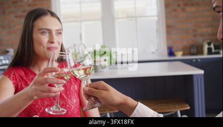 Happy couple having valentine's day celebration meal at home Stock Photo