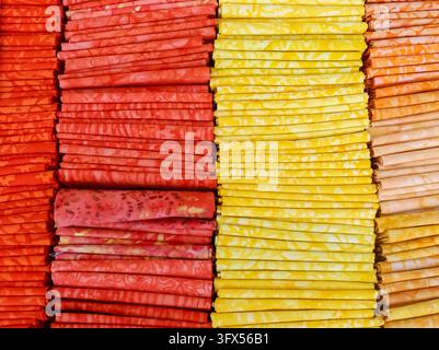 Samples of cloth and fabrics in different colors found at a fabrics market Stock Photo