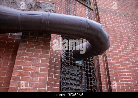 Side of building with vent Stock Photo