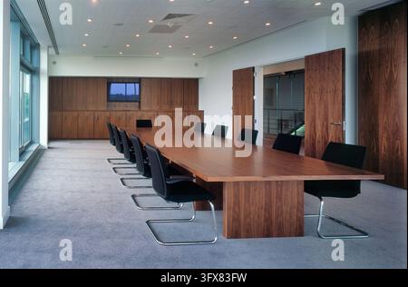 Higgins Group plc headquarters in Loughton, Essex, featuring a contemporary glass and steel office facade with external metal sunshading. Stock Photo