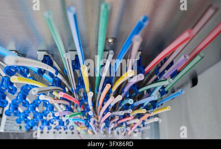 Hanover, Germany. 22nd Oct, 2026. ILLUSTRATION - Empty conduits for fiber-optic connections lie in a distribution box in the Hanover region (illustrative image related to Internet connections). A serious security vulnerability has threatened numerous websites and online services worldwide. The widely used programming language PHP, on which a large part of the entire Internet is based, was affected. Credit: Julian Stratenschulte/dpa/Ģ����ý Live News Stock Photo