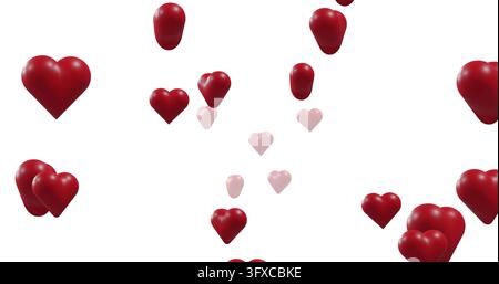 Floating cluster of red and pink 3D hearts forming glossy layered composition on white backdrop. Dimensional, depth, crimson, rose, polished, minimali Stock Photo