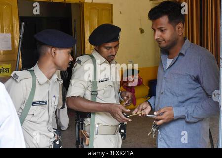 Constituency Example PATNA, INDIA - OCTOBER 23: Police personnel checking stand guard during ...