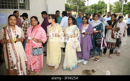 Constituency Example PATNA, INDIA - OCTOBER 23: Voters standing in queue for casting their ...
