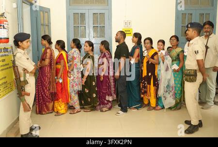 Constituency Example PATNA, INDIA - OCTOBER 23: Voters standing in queue for casting their ...
